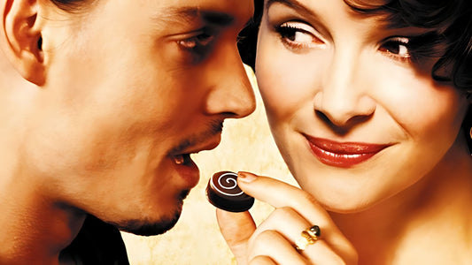 The film CHOCOLAT uses food, particularly chocolate, to explore themes of temptation, pleasure, and transformation.